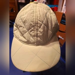 Green quilt style hat. New.